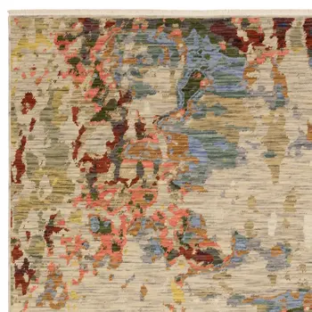 10' X 13' Beige Salmon And Tan Abstract Area Rug With Fringe