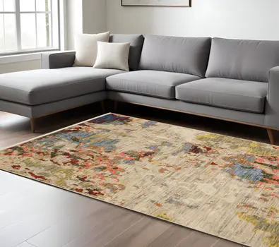 8' X 11' Beige Salmon And Tan Abstract Area Rug With Fringe