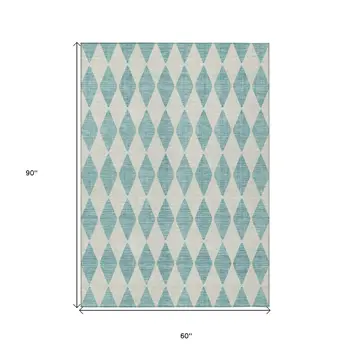5' X 8' Teal Blue And Ivory Geometric Washable Indoor Outdoor Area Rug