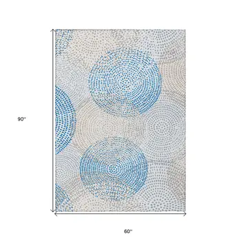 5' X 8' Ivory Blue And Taupe Polka Dot Washable Indoor Outdoor Area Rug