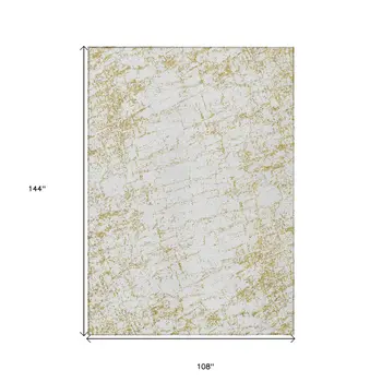 9' X 12' Gold And Ivory Abstract Washable Indoor Outdoor Area Rug