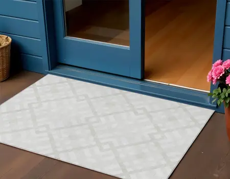 3' X 5' Ivory Beige And Tan Geometric Washable Indoor Outdoor Area Rug