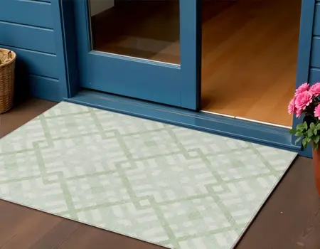 3' X 5' Mint Green And Ivory Geometric Washable Indoor Outdoor Area Rug
