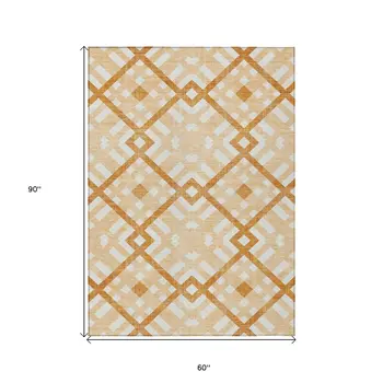 5' X 8' Peach Orange And Ivory Geometric Washable Indoor Outdoor Area Rug