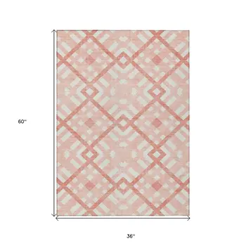 3' X 5' Salmon Peach And Ivory Geometric Washable Indoor Outdoor Area Rug