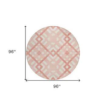 8' Salmon Peach And Ivory Round Geometric Washable Indoor Outdoor Area Rug