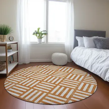 8' Orange And Ivory Round Geometric Washable Indoor Outdoor Area Rug
