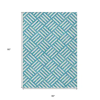 5' X 8' Teal Blue And Ivory Geometric Washable Indoor Outdoor Area Rug