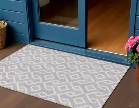 3' X 5' Lavender And Ivory Geometric Washable Indoor Outdoor Area Rug