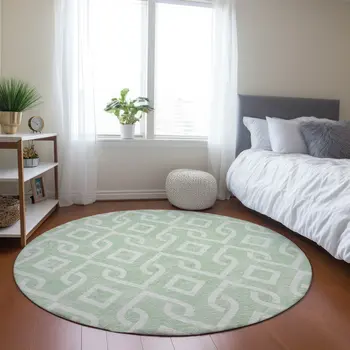 8' Mint Green And Ivory Round Geometric Washable Indoor Outdoor Area Rug