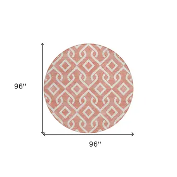 8' Salmon And Ivory Round Geometric Washable Indoor Outdoor Area Rug