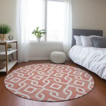 8' Salmon And Ivory Round Geometric Washable Indoor Outdoor Area Rug