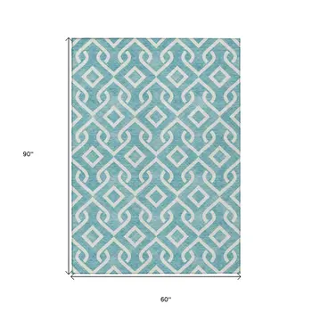 5' X 8' Teal Blue And Ivory Geometric Washable Indoor Outdoor Area Rug