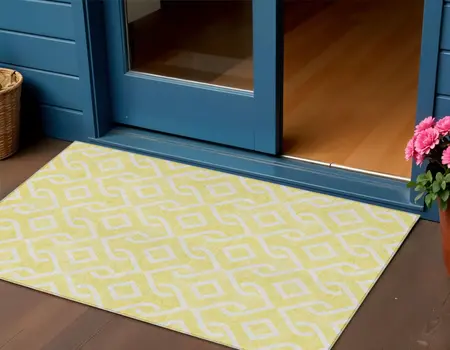 3' X 5' Yellow And Ivory Geometric Washable Indoor Outdoor Area Rug