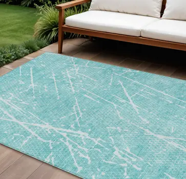 10' X 14' Teal Blue And Ivory Abstract Washable Indoor Outdoor Area Rug