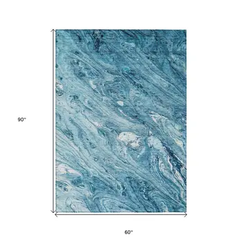 5' X 8' Sky Blue And Navy Blue Abstract Washable Indoor Outdoor Area Rug