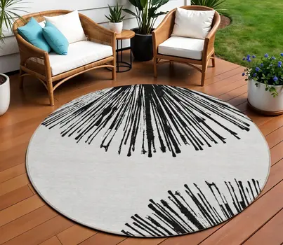 8' Black And Ivory Round Abstract Washable Indoor Outdoor Area Rug