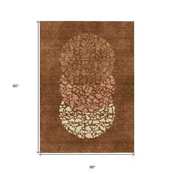 5' X 8' Orange Terra Cotta And Ivory Abstract Washable Indoor Outdoor Area Rug