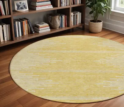 8' Gold And Ivory Round Abstract Washable Indoor Outdoor Area Rug