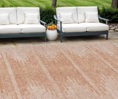 10' X 14' Salmon And Ivory Abstract Washable Indoor Outdoor Area Rug