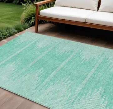 9' X 12' Aquamarine And Ivory Abstract Washable Indoor Outdoor Area Rug