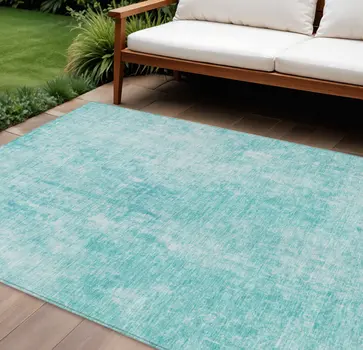 9' X 12' Teal Blue And Ivory Abstract Washable Indoor Outdoor Area Rug