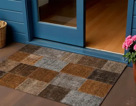 3' X 5' Orange And Taupe Patchwork Washable Indoor Outdoor Area Rug