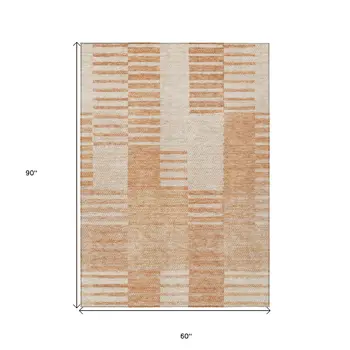 5' X 8' Salmon Peach And Ivory Striped Washable Indoor Outdoor Area Rug