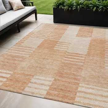 5' X 8' Salmon Peach And Ivory Striped Washable Indoor Outdoor Area Rug