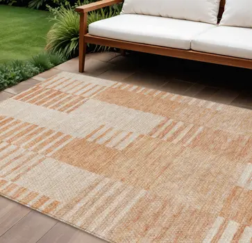 8' X 10' Salmon Peach And Ivory Striped Washable Indoor Outdoor Area Rug