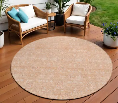 8' Peach And Ivory Round Floral Washable Indoor Outdoor Area Rug