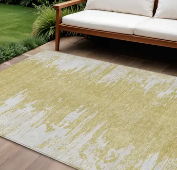 10' X 14' Gold And Ivory Abstract Washable Indoor Outdoor Area Rug