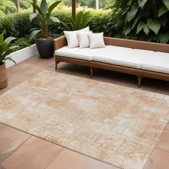 10' X 14' Coral Peach And Ivory Abstract Washable Indoor Outdoor Area Rug