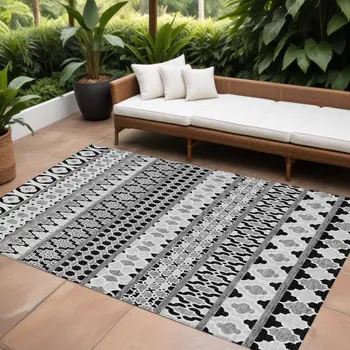 9' X 12' Black Gray And Ivory Quatrefoil Washable Indoor Outdoor Area Rug