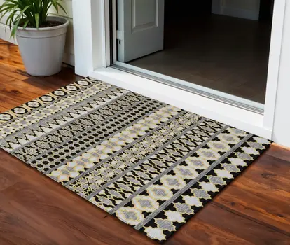 3' X 5' Charcoal Gray And Gold Quatrefoil Washable Indoor Outdoor Area Rug
