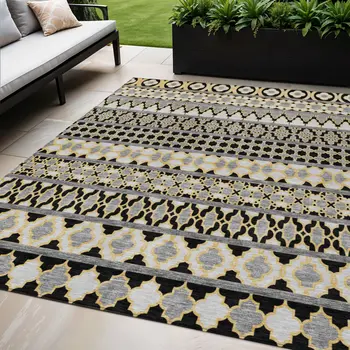5' X 8' Charcoal Gray And Gold Quatrefoil Washable Indoor Outdoor Area Rug