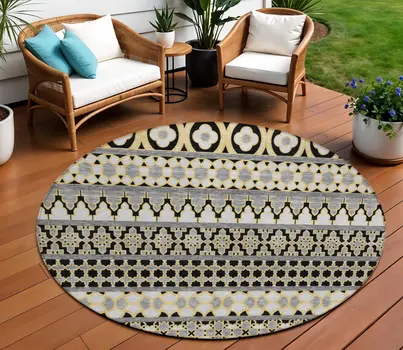 8' Charcoal Gray And Gold Round Quatrefoil Washable Indoor Outdoor Area Rug