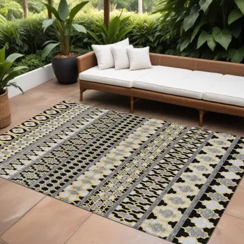 9' X 12' Charcoal Gray And Gold Quatrefoil Washable Indoor Outdoor Area Rug