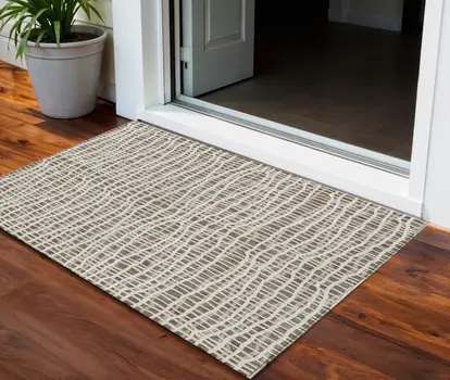 3' X 5' Brown Beige And Ivory Striped Washable Indoor Outdoor Area Rug