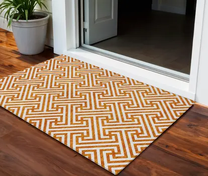 3' X 5' Orange And Ivory Geometric Washable Indoor Outdoor Area Rug