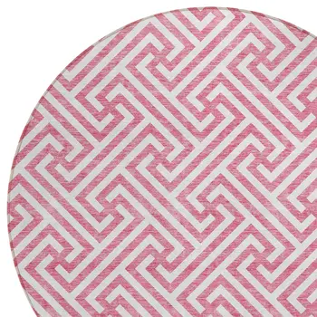 8' Pink And Ivory Round Geometric Washable Indoor Outdoor Area Rug