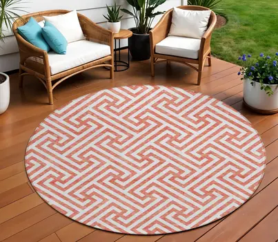 8' Salmon And Ivory Round Geometric Washable Indoor Outdoor Area Rug
