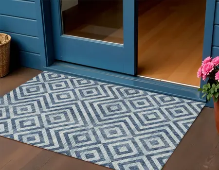 3' X 5' Navy Blue And Ivory Geometric Washable Indoor Outdoor Area Rug