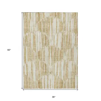 3' X 5' Gold Beige And Ivory Abstract Washable Indoor Outdoor Area Rug