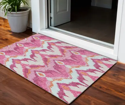 3' X 5' Pink Mauve And Orange Ikat Washable Indoor Outdoor Area Rug