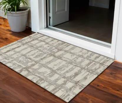 3' X 5' Beige Brown And Taupe Striped Washable Indoor Outdoor Area Rug