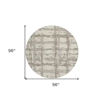 8' Beige Brown And Taupe Round Striped Washable Indoor Outdoor Area Rug