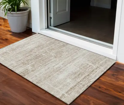 3' X 5' Beige Taupe And Ivory Abstract Washable Indoor Outdoor Area Rug
