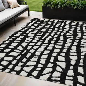5' X 8' Black And Ivory Abstract Washable Indoor Outdoor Area Rug