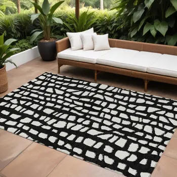 9' X 12' Black And Ivory Abstract Washable Indoor Outdoor Area Rug